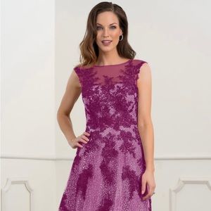 Beautiful dress in Orchid. Size 6 which will include sheer cover jacket.